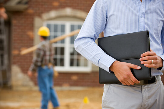 Construction: Agent Holding Portfolio with Worker in Background