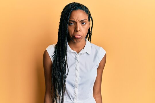 African american woman wearing casual clothes depressed and worry for distress, crying angry and afraid. sad expression.