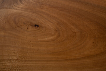 Fototapeta premium Beautiful wooden background made of cross-cut wood with a pattern of rings