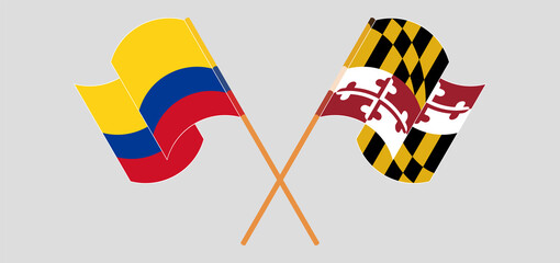 Crossed and waving flags of Colombia and the State of Maryland