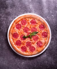 Pepperoni Pizza with sausage. Top view. Unhealthy food