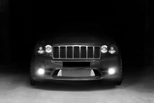 Kiev, Ukraine - September 8, 2013: Jeep Grand Cherokee SRT8. Car in the shade. black and white photo