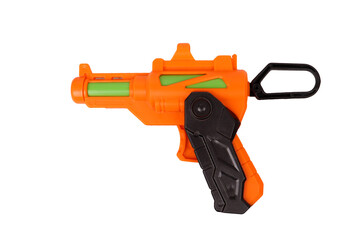 The orange gun. Children's toy weapons.  On a white background, isolated.