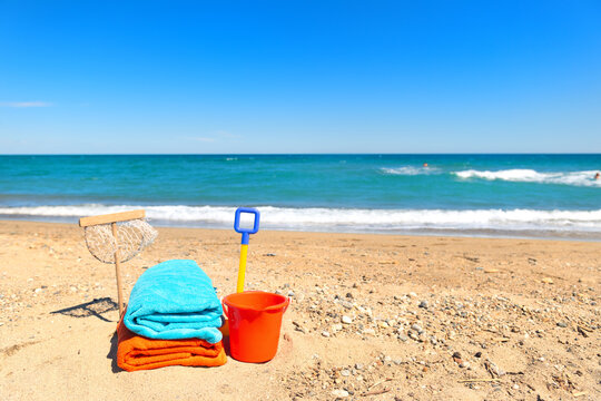 Beach towels and toys for summer vacation
