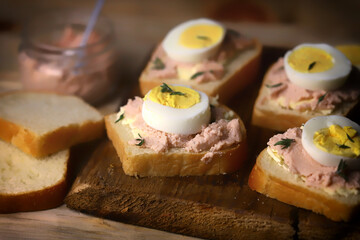Selective focus. Sandwiches with cod roe and egg. Healthy snack. Keto.