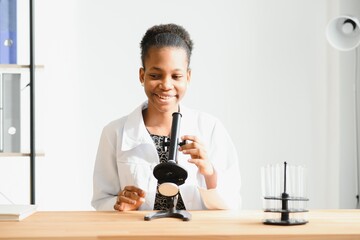 Medical doctor woman working at laboratory - copyspace