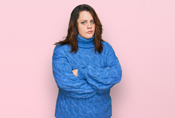 Young plus size woman wearing casual clothes skeptic and nervous, disapproving expression on face...