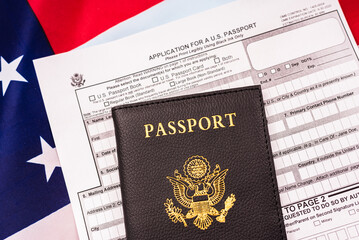 Application form to get a new American passport, patriotic flag background.