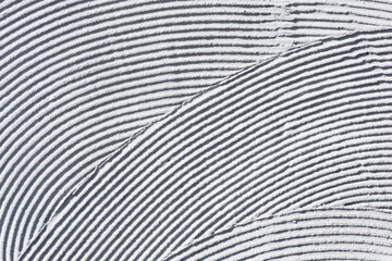 Facade plaster background. Gray plaster stripes pattern. Tile adhesive texture. Home renovation...
