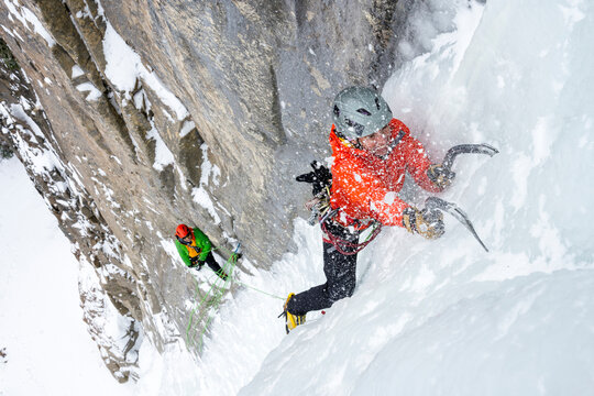 A couple climbing Ames Ice Hose, Uncompahgre National Forest, Ames, Colorado.
