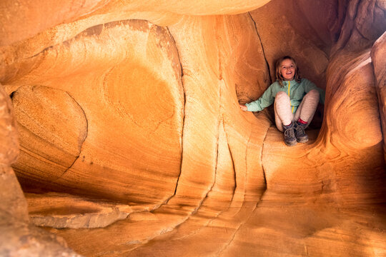 A girl hiking Angel's Landing,  West Rim Trail, Zion National Park, Springdale, Utah.