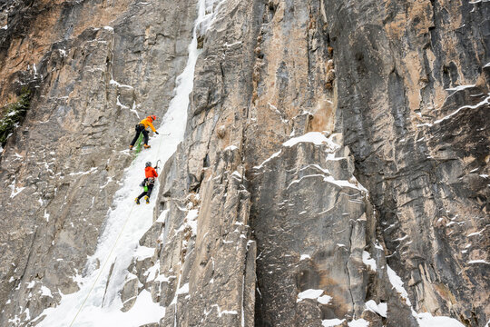 A couple climbing Ames Ice Hose, Uncompahgre National Forest, Ames, Colorado.