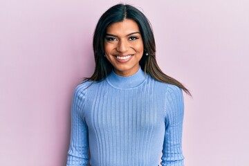 Young latin transsexual transgender woman wearing casual clothes with a happy and cool smile on face. lucky person. - obrazy, fototapety, plakaty