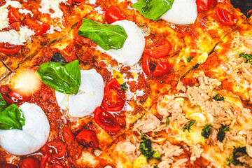 Detail of pizzeria counter with gormet type of pizza display. Italian colours and flavours. Fine...