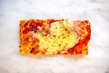 Pizza slice with tomato sauce and mozzarella cheese