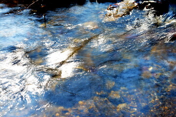 Beautiful water texture. River in motion. Water natural background.