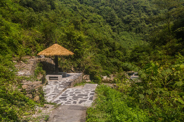 Fototapeta na wymiar Rest area near Dehang Miao village, Hunan province, China