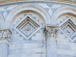 Fototapeta premium Pisa, Italy. Leaning Tower of Pisa with sunset light and blue sky