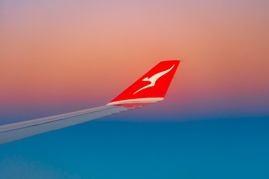 Melbourne, Australia - Apr 25, 2019: Qantas plane wing at sunrise