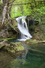 Close up of vaioaga waterfall with crystal clear water.