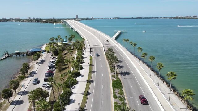 Beautiful ariel of the John Ringling Causeway in Sarasota, Florida.  Tourist love the palm line streets