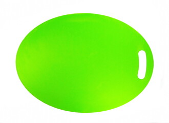 Green plastic cutting board on white background 