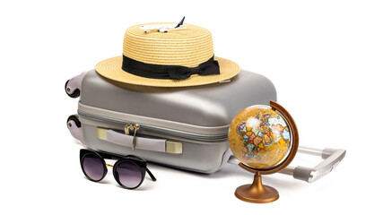 Baggage isolated. Travel accessories with suitcase, straw hat, toy airplane and globe in minimal trip vacation concept isolated on white background. Summer vacation and product advertisement concept.