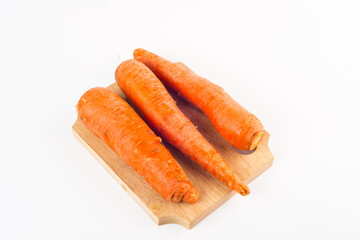 clean carrots on  cutting board