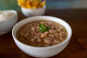 Bowl of beans, brazilian food. Brown