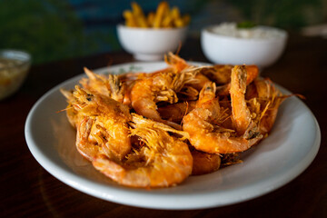 fried shrimps with rice and chips