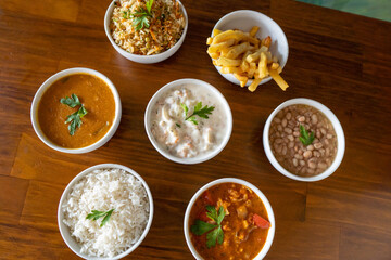 food bowls: rice, seafood, shrimp, beans, chips - side dishes
