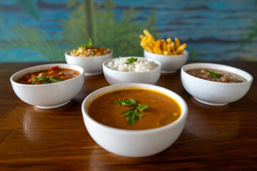 food bowls: rice, seafood, shrimp, beans, chips - side dishes