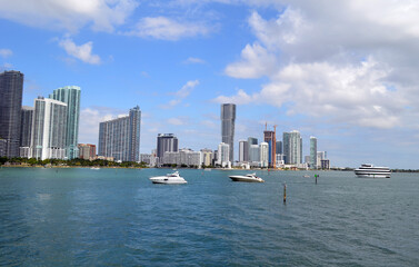 Panoramic view of Saturday morning boat traffic on Biscayne Bay and exteriors of condominium towers on the western shoreline of the bay.