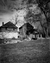 Obraz premium Old Mill from Behind Showing Water Wheel