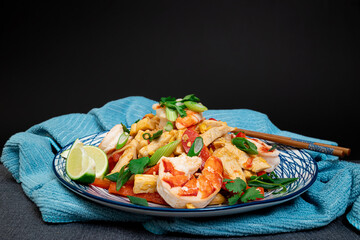 Classic Pad Thai with shrimp me tofu on a beautiful decorative plate