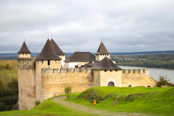 Fototapeta na wymiar Khotyn fortress of the X XVIII centuries with a fortification complex, One of the seven wonders of Ukraine located on the right bank of the river. Dniester in the city of Khotyn.