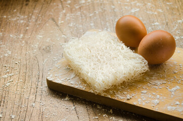 Raw vermicelli and eggs of flour