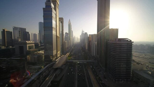 Dubai, United Arab Emirates - 16 March 2021: Aerial view of Sheikh Zayed road crossing the financial district with tall skyscrapers in Dubai downtown, United Arab Emirates.