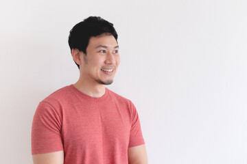 Smile face of Happy Asian man in red t-shirt isolated on white background.
