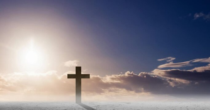 Animation of christian cross over sun shining on blue sky with clouds