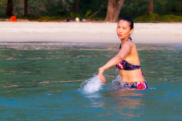Woman is traveler happy in water