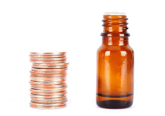 Dollar coins and medicine bottles