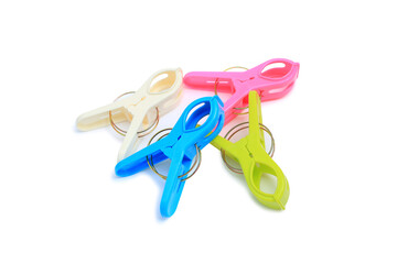 Colorful plastic clothespin isolated on white background
