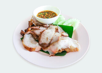 Charcoal-boiled pork neck or grilled pork neck with cucumber and with spicy dipping sauce, Thai food with clipping path