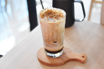 Milk and coffee with ice. Photo concept for commercial use.