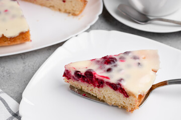 Homemade cake with cranberries and sour cream. Piece of pie close up