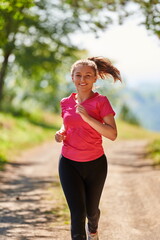 woman enjoying in a healthy lifestyle while jogging