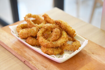 Onion ring fries served on the table. Photo concept for commercial use 