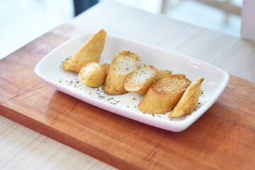 Grilled fish cake served on the table. photo concept for commercial use 
