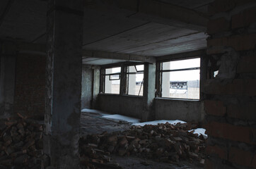 Fototapeta na wymiar broken window in an abandoned building. photo of stalkers